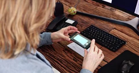 Remote Check Deposit Using Mobile Remote Stock Photos