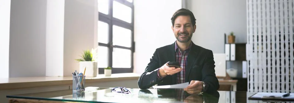 Remote Cheque Deposit Using Mobile Phone Stock Photos