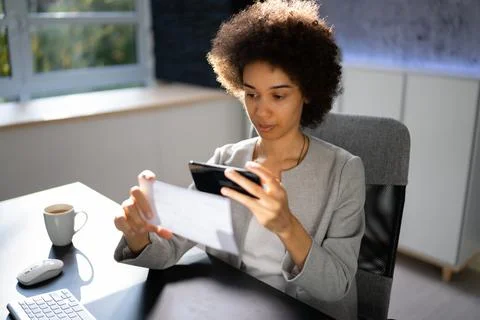 Remote Cheque Deposit Using Mobile Phone Stock Photos