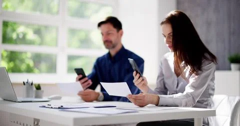 Remote Cheque Deposit Using Mobile Phone Stock Photos