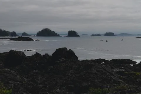Remote coastal view with islands, cliffs and clouds Stock-Fotos