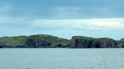 Remote Coastline of the Outer Hebrides, Scotland with Rugged Sea Cliffs Stock Footage 336472857
