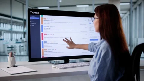 Remote Computer Support Worker Checking Tickets Stock Footage 322863674