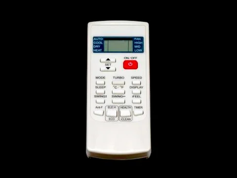 A remote control for air conditioner isolated on black background. Stock Photos