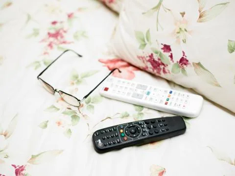 Remote Control On Bed Photos