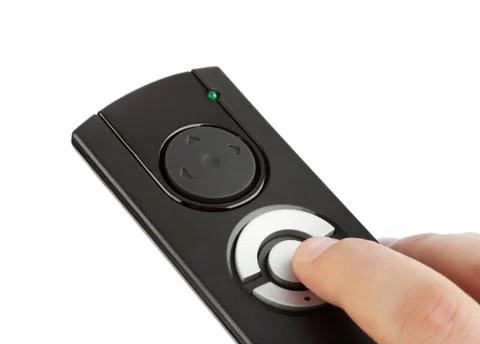 Remote control with blank buttons in hand 스톡 사진