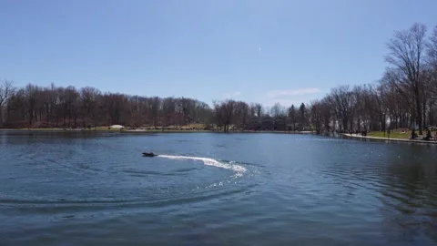 Remote Control Boat on Lake in Mount Royal Park Montreal Stock Footage 334733120