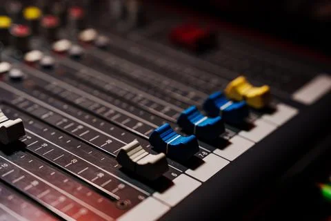 Remote control for brightness and volume of light and music equipment at an  Stock Photos