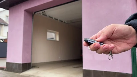 Remote control is broken, garage door is not close. Stock Footage 346721122