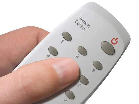 Remote control with buttons 1-9 and Power in hand - isolated on white (cli... Foto stock