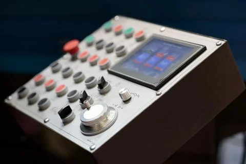 Remote control console of manufacturing machine Stock Photos