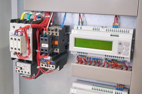 Remote control controller, two contactors in the electrical Cabinet. Stock Photos