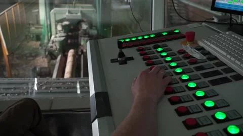 Remote control of the conveyor with logs Stock Footage 145426966