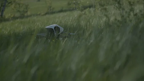 Remote control drone on a field ready for take off Stockbeeldmateriaal 94604207