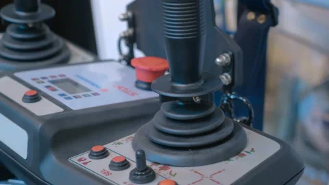 Remote control of equipment with  joysticks, control monitor, function buttons Stock Footage 187518088