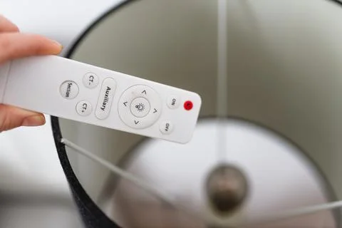 Remote control for floor lamp.Smart home concept. Stock Photos