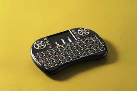 A remote control in the form of a keyboard to control a TV box Stock Photos