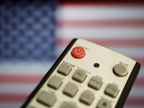 Remote Control in Front of American Flag Stock Photos