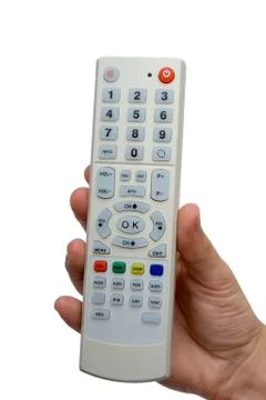Remote control in hand Stock Photos