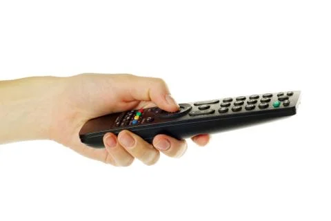 Remote control in hand Stock Photos
