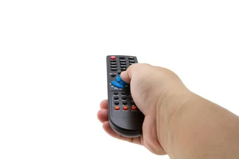 Remote control in hand Stock Photos