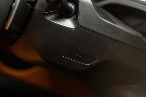 Remote control key in vehicle interior. Modern Car remote control key. Stock Photos