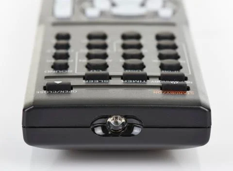 Remote control keypad black in closeup on white isolated Stock Photos