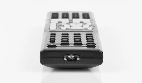 Remote control keypad black in closeup on white isolated Stock Photos