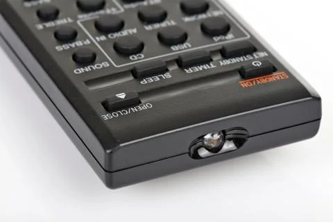 Remote control keypad black in closeup on white isolated Stock Photos