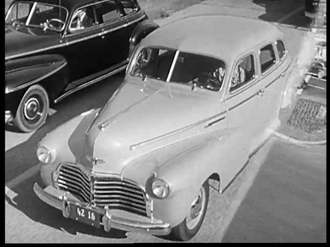 A remote control lever makes it easier for a driver to put their car in and out Stock Footage 75191379