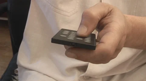 Remote control in man's hands Stock Footage 39151577