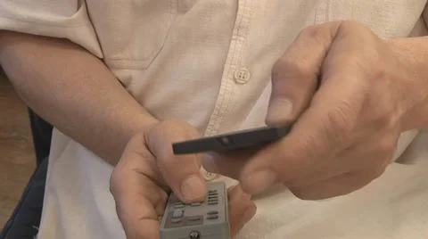 Remote control in man's hands Stock Footage 39154025
