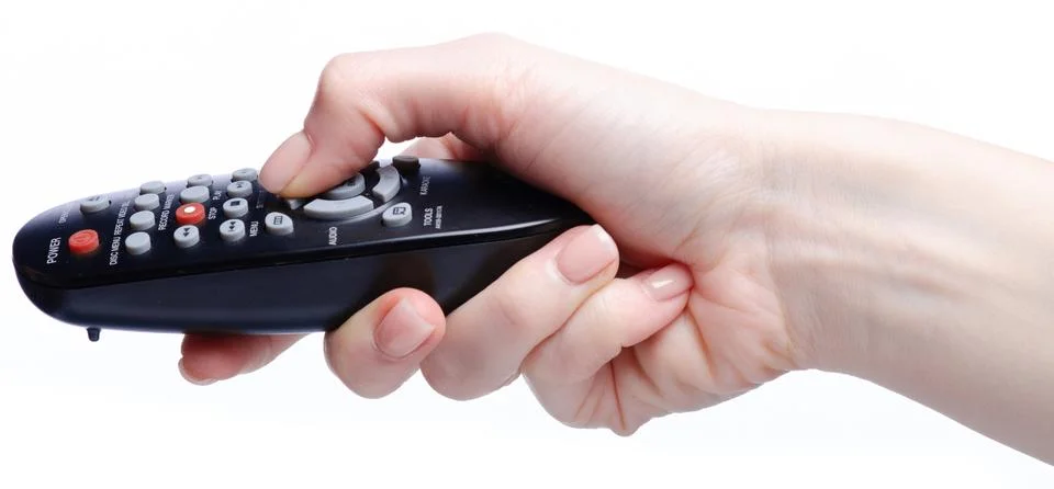 Remote Control media in hand Stock Photos