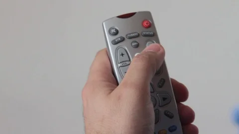 Remote control in mens hand Stock Footage 85921635