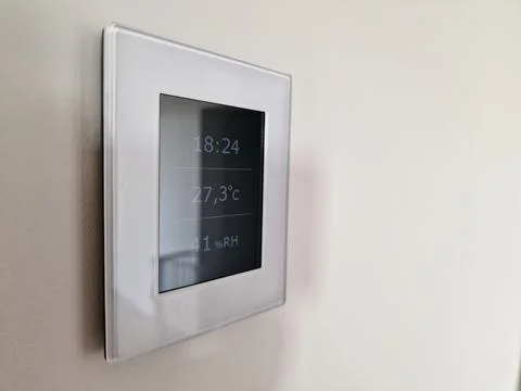 Remote control for smart house climate and fresh air Stock Photos