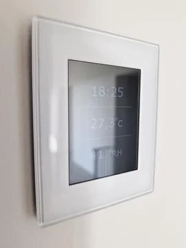 Remote control for smart house climate and fresh air Stock Photos