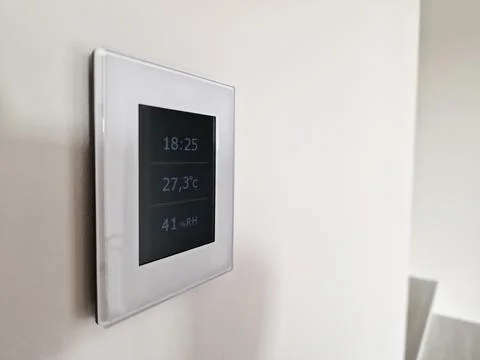 Remote control for smart house climate and fresh air Stock Photos