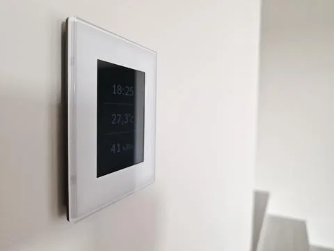 Remote control for smart house climate and fresh air Stock Photos