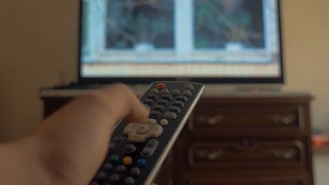 Remote control to TV Stock Footage 87199731