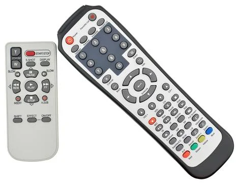 Remote control units on a white Stock Photos