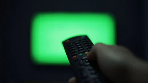 Remote Control Used To Navigate On A Smart Tv Television Green Screen Stock Footage 127697974