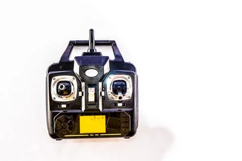 A remote control with a yellow screen Foto stock