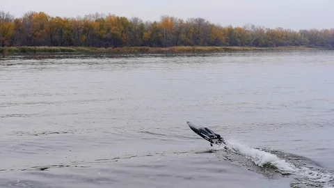 Remote controled speedboat on the river Stock Footage 97862991
