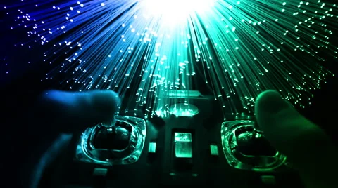 Remote controll with with Fiber optics background, shot in HD Stock Footage 66336573
