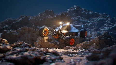 Remote-controlled car standing on rocks during the night. Camera pitch. 4KHD Video stock 126296538