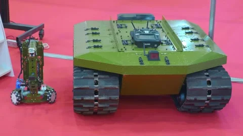 Remote-controlled robot on rubber tracks for safe exploration of hazardous areas Stock Footage 330876883