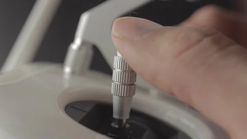 Remote controller close up. Control the drone with the remote controller sticks Stockbeeldmateriaal 128631648