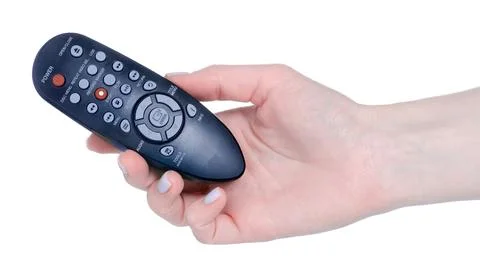 Remote controller in hand Stock Photos