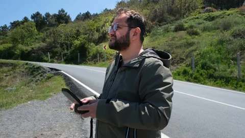 Remote controlling drone Stock Footage 196763761