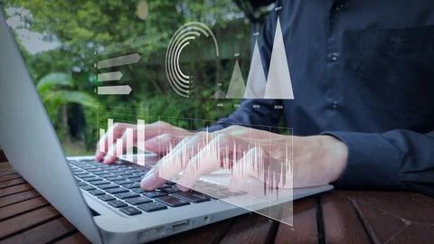 Remote Data Analysis with Monthly Trend Graph Overlay Stock Photos